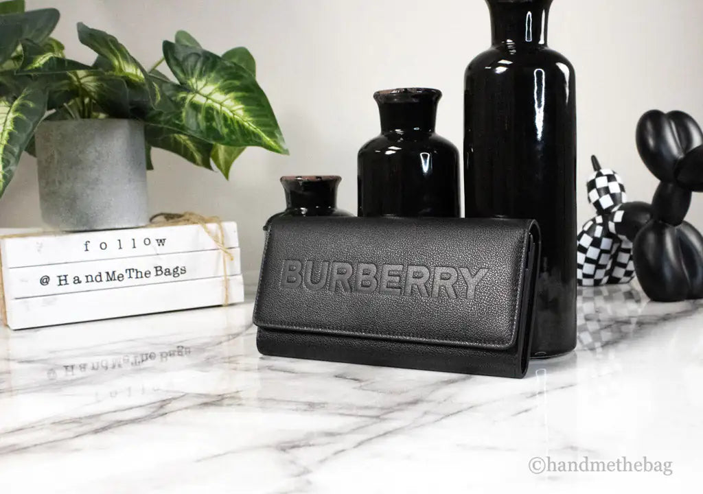 Burberry Porter 黑色皮革品牌压纹手拿包翻盖钱包