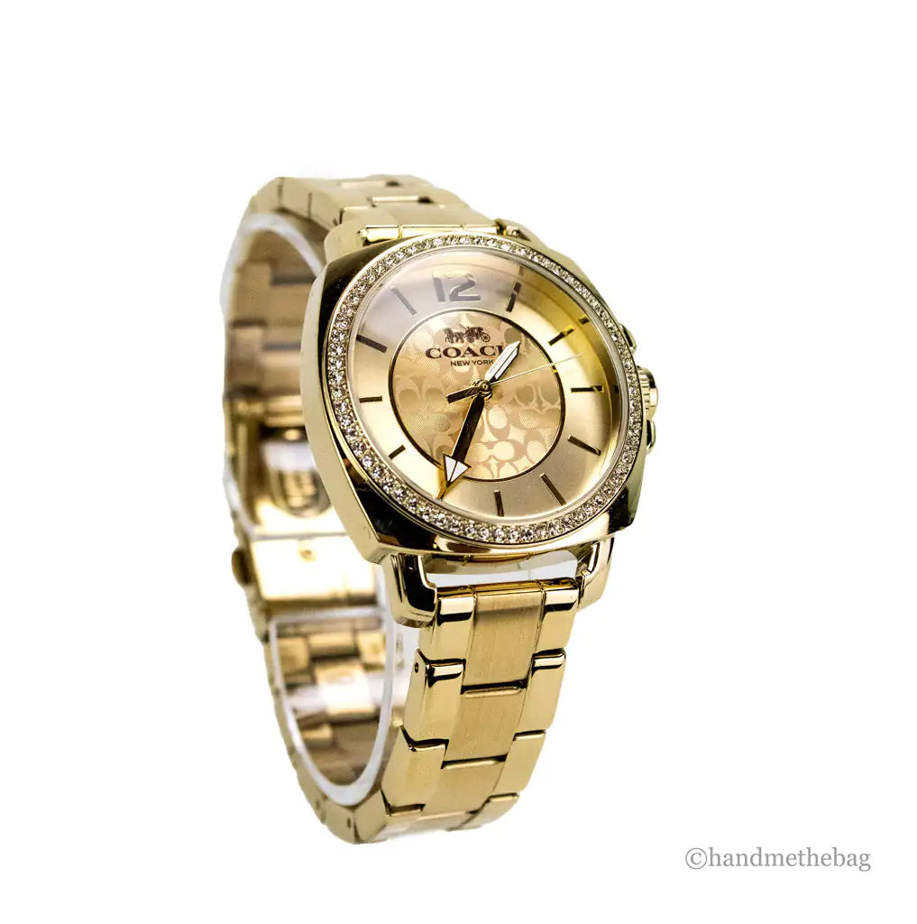 Reloj de pulsera Coach Boyfriend con bisel de cristal en tono dorado amarillo